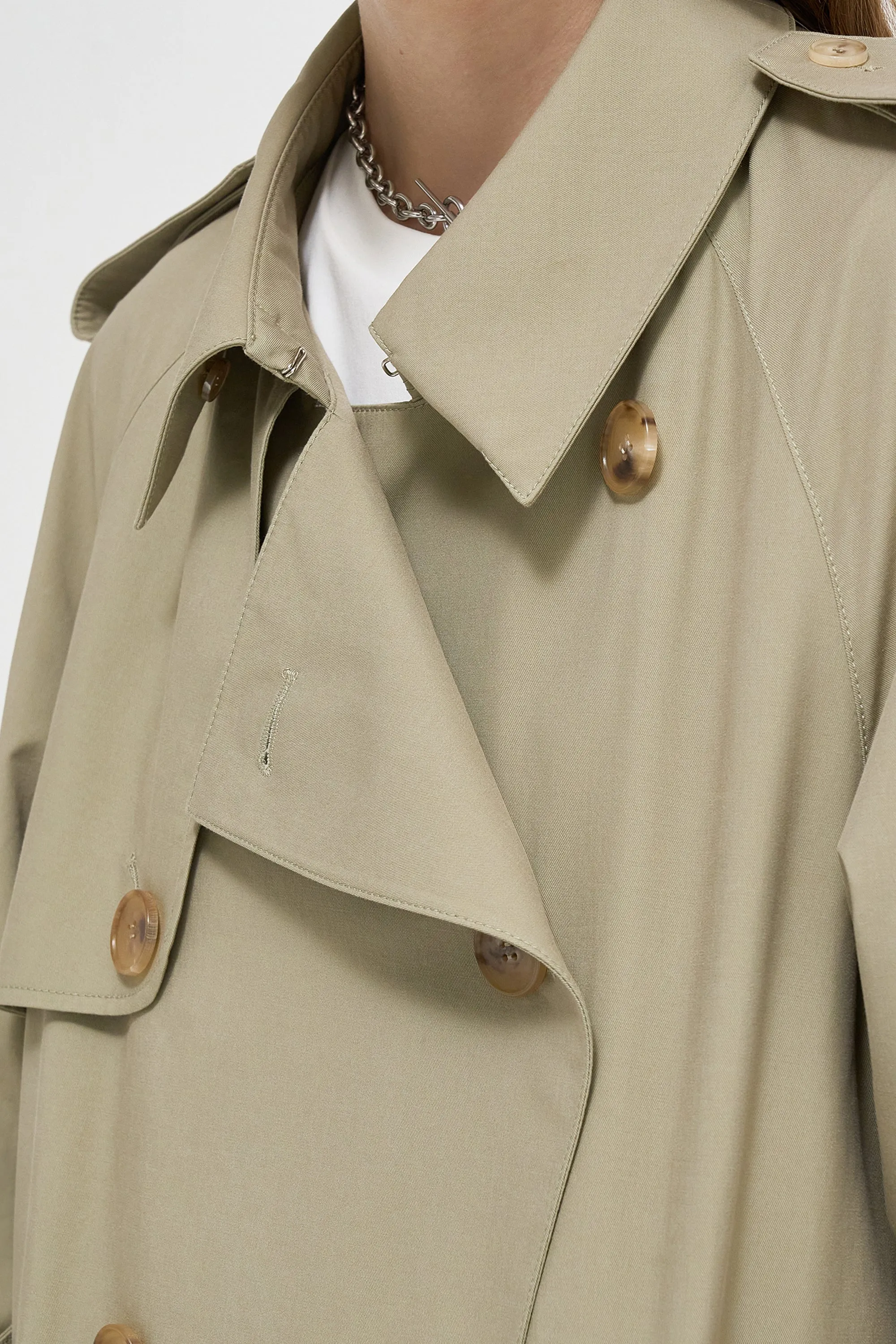 Double-breasted handkerchief hem trench coat