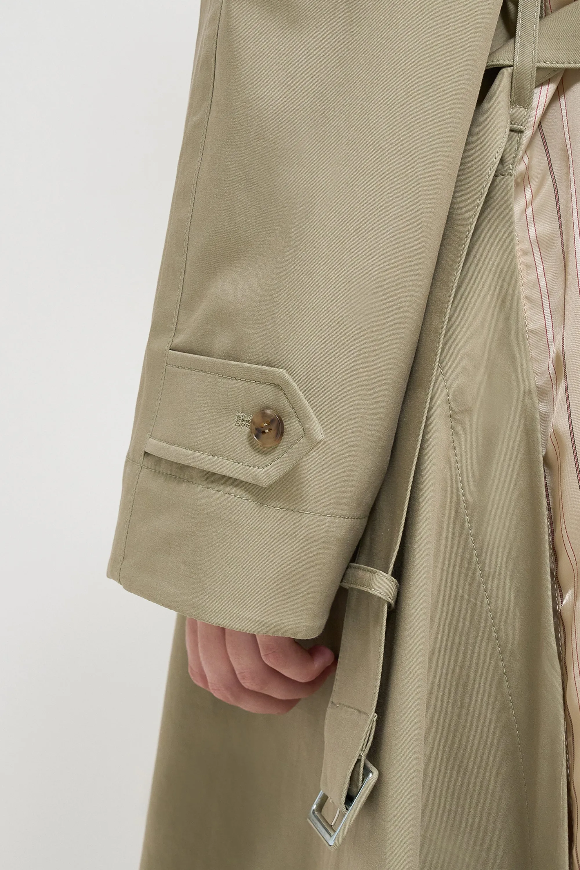 Double-breasted handkerchief hem trench coat